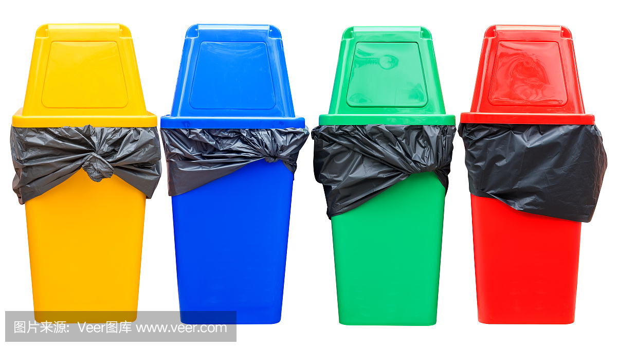 黃色,藍色,綠色和紅色的回收站在白色。